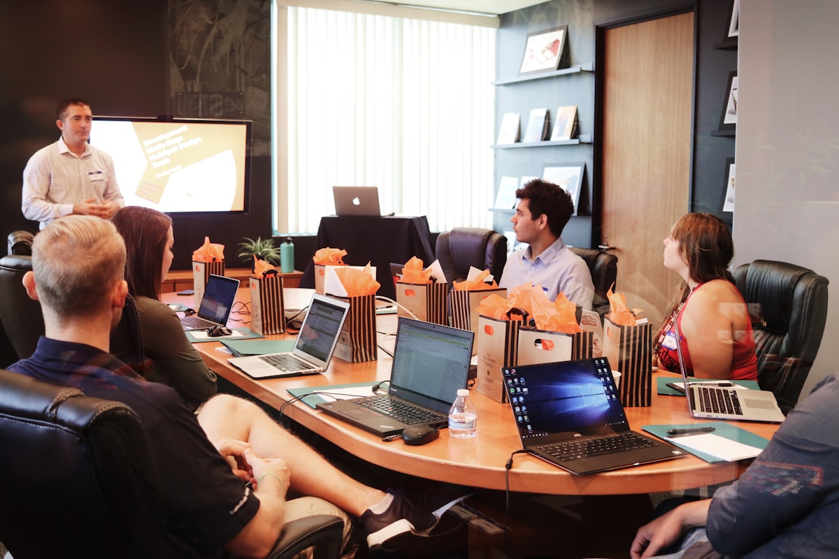 Team workshop packaging AI-assisted services for client markets